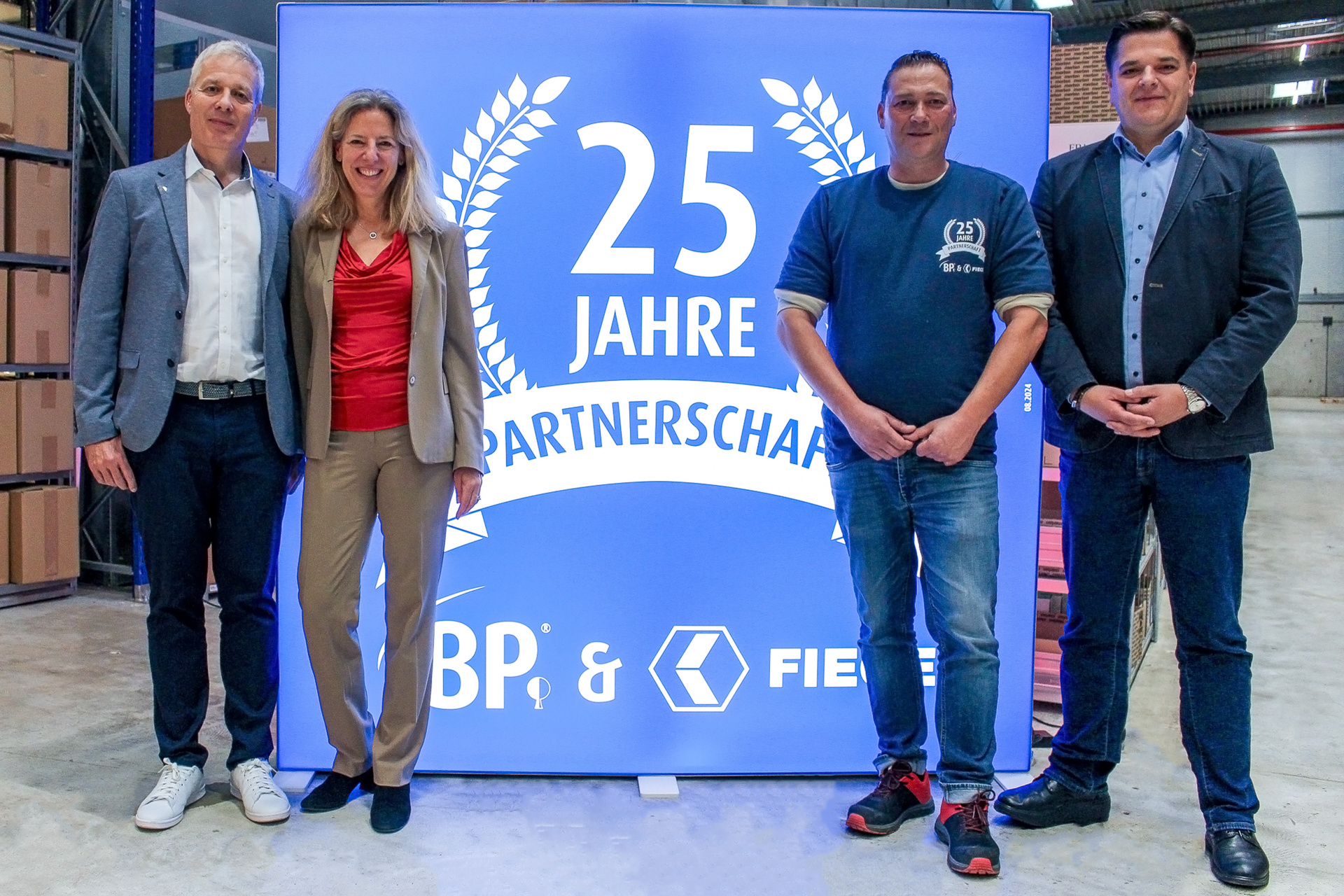 Harald Goost, geschäftsführender Gesellschafter von BP, Meike Schmidt-Krenz, Managing Director des Fiege-Geschäftsbereichs Consumer Products, Gerrit Heinke, Abteilungsleiter BP bei Fiege, und Maik Friedrichs, Geschäftsführer von BP.